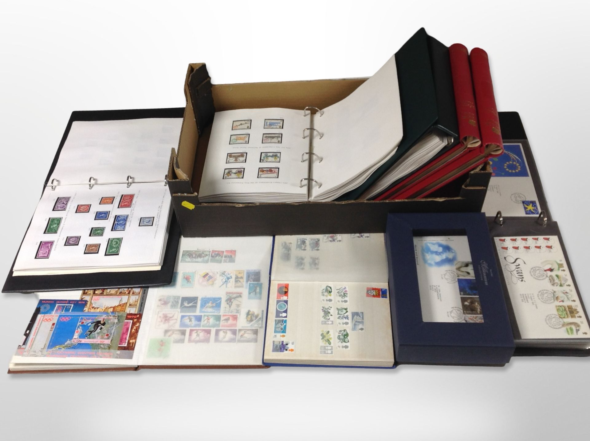 Several albums of stamps and first day covers.