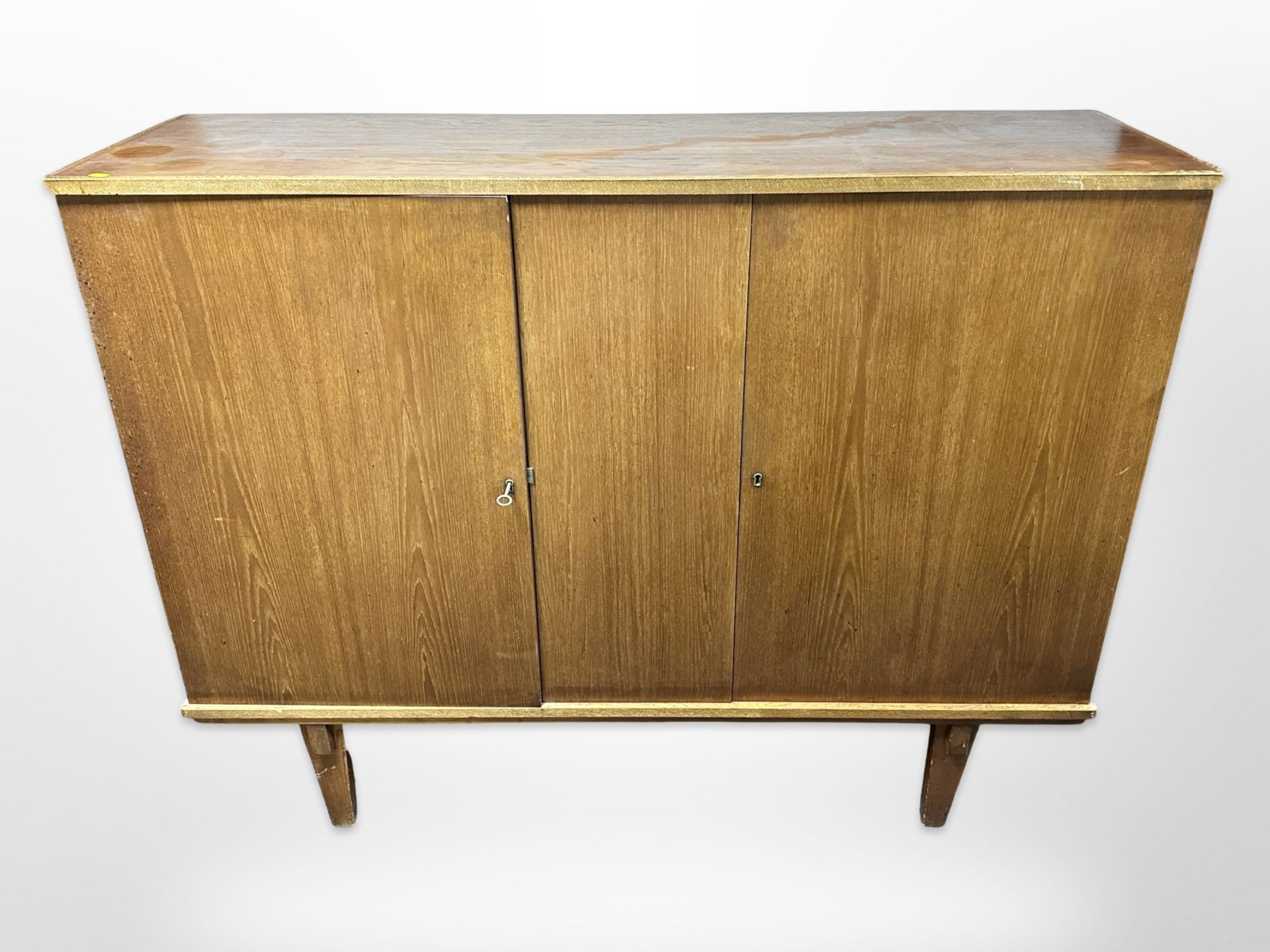 A 20th century Danish teak sideboard fitted with two cupboards,