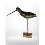 An American shorebird decoy with percussive slate plates to underside to mimic the call of a bird,