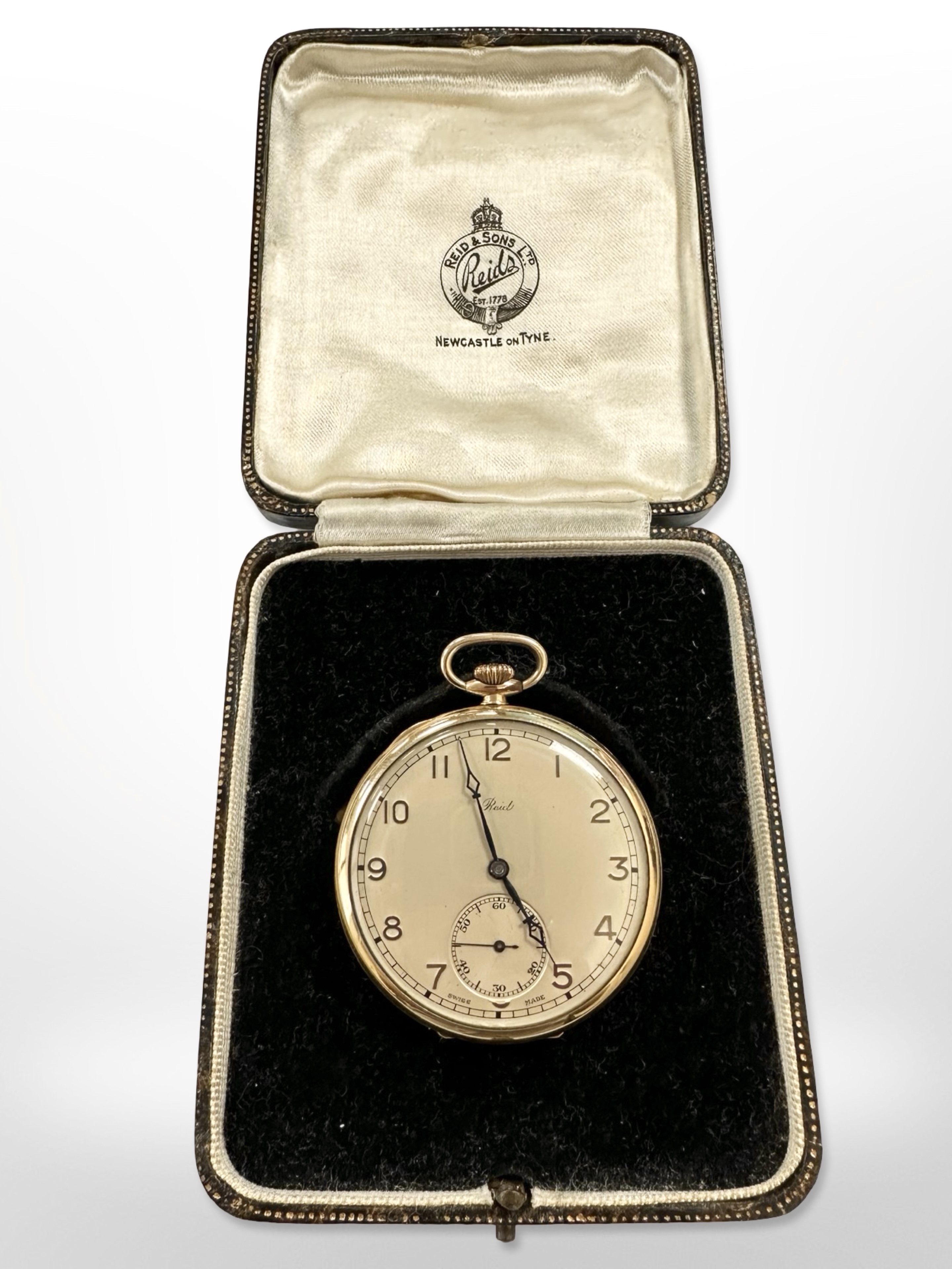 A Dennison Watch Company gold plated pocket watch, retailed by Reids of Newcastle upon Tyne,
