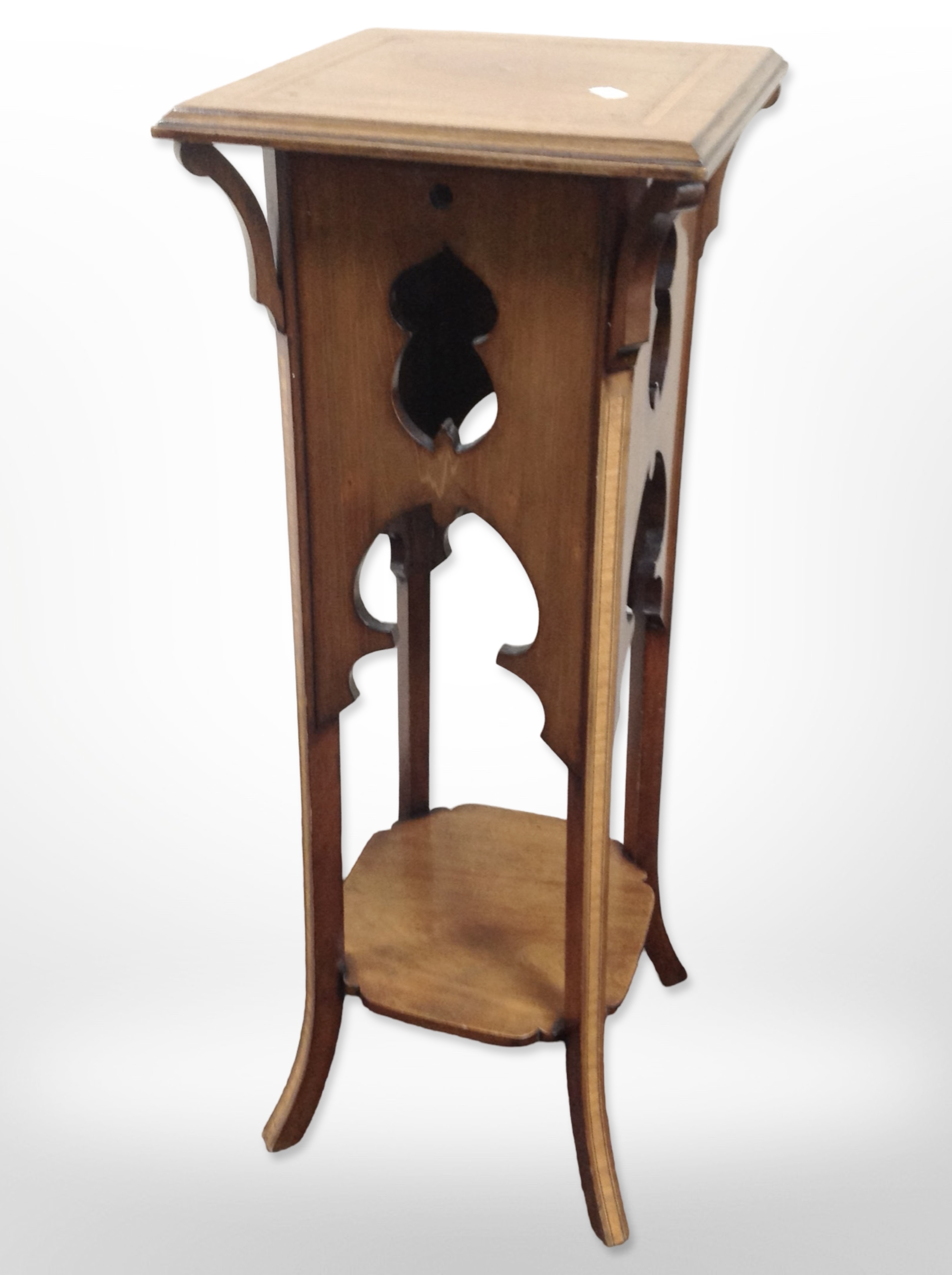 An early 20th century inlaid mahogany plant stand,
