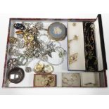 A collection of costume jewellery including earrings, brooches, necklaces, Jasperware compact,