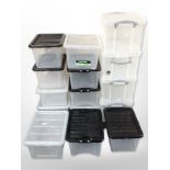 Fifteen plastic storage boxes with lids