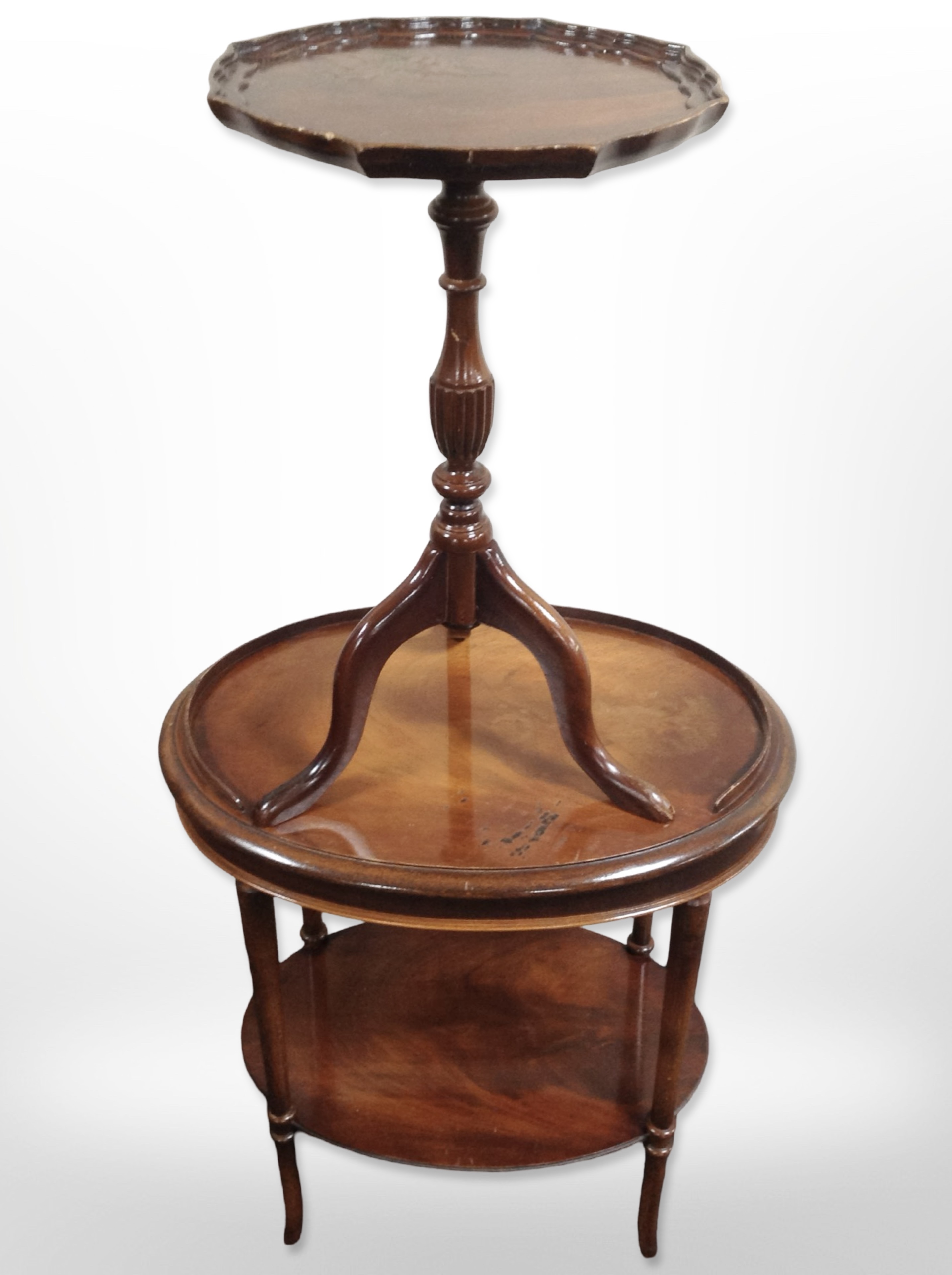 A reproduction mahogany oval two tier table,