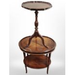 A reproduction mahogany oval two tier table,