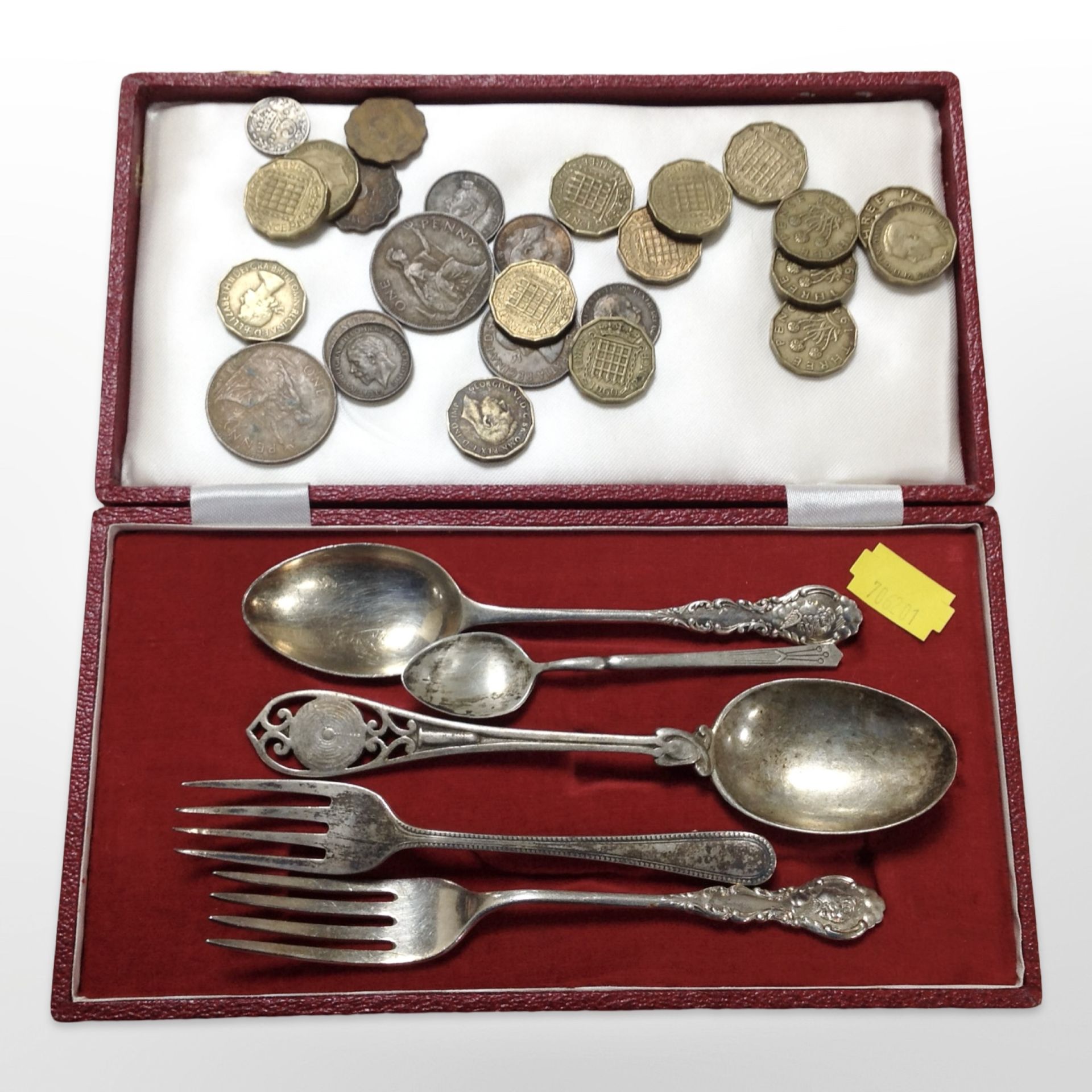 Five pieces of silver cutlery, British 3p pieces, etc. CONDITION REPORT: Silver 108.