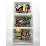 Three crates containing vintage children's toys, die-cast model vehicles,