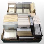 A large quantity of modern photo frames in rustic gilt and silvered finishes.