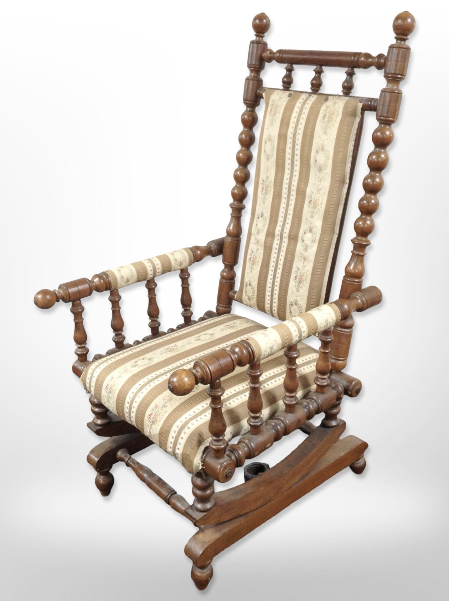 A 20th century Scandinavian bobbin turned beech rocking chair