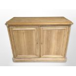 An early 20th century Scandinavian pine double door side cabinet,