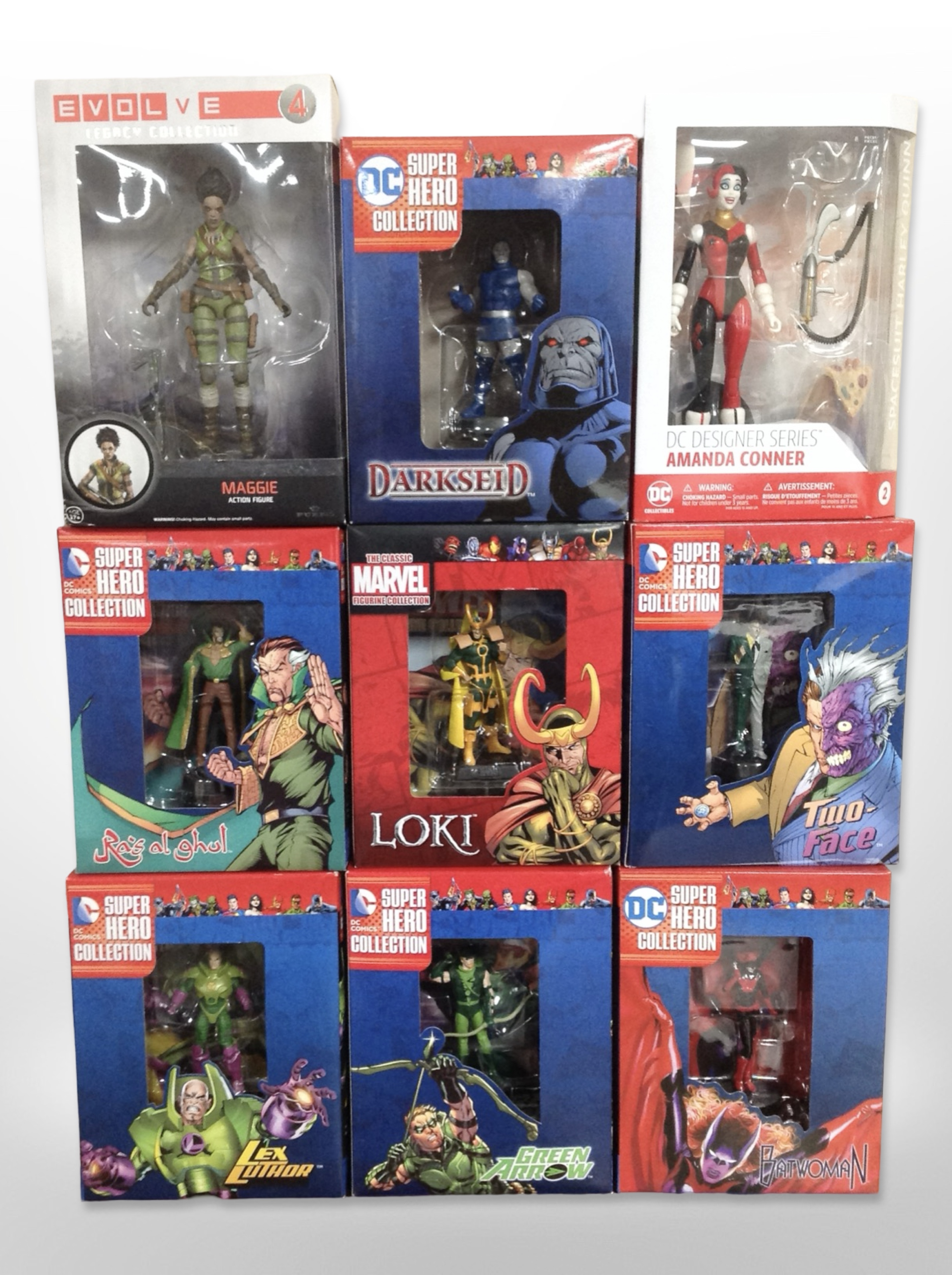 Seven DC Comics superhero figurines, a further Marvel figurine, and a Funko Evolve figurine,