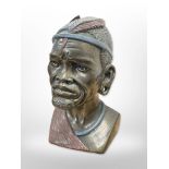 A cold-cast bronze bust of an African man by Casper Darare, number 339/400,