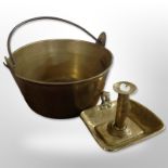 A brass jam pan and a chamber stick