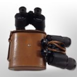 A pair of Soviet Tento binoculars in leather case, and a further pair of Omega 7x50 binoculars.