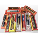 A collection of Hornby and Lima 00 gauge locomotives, passenger cars and tenders, all boxed.