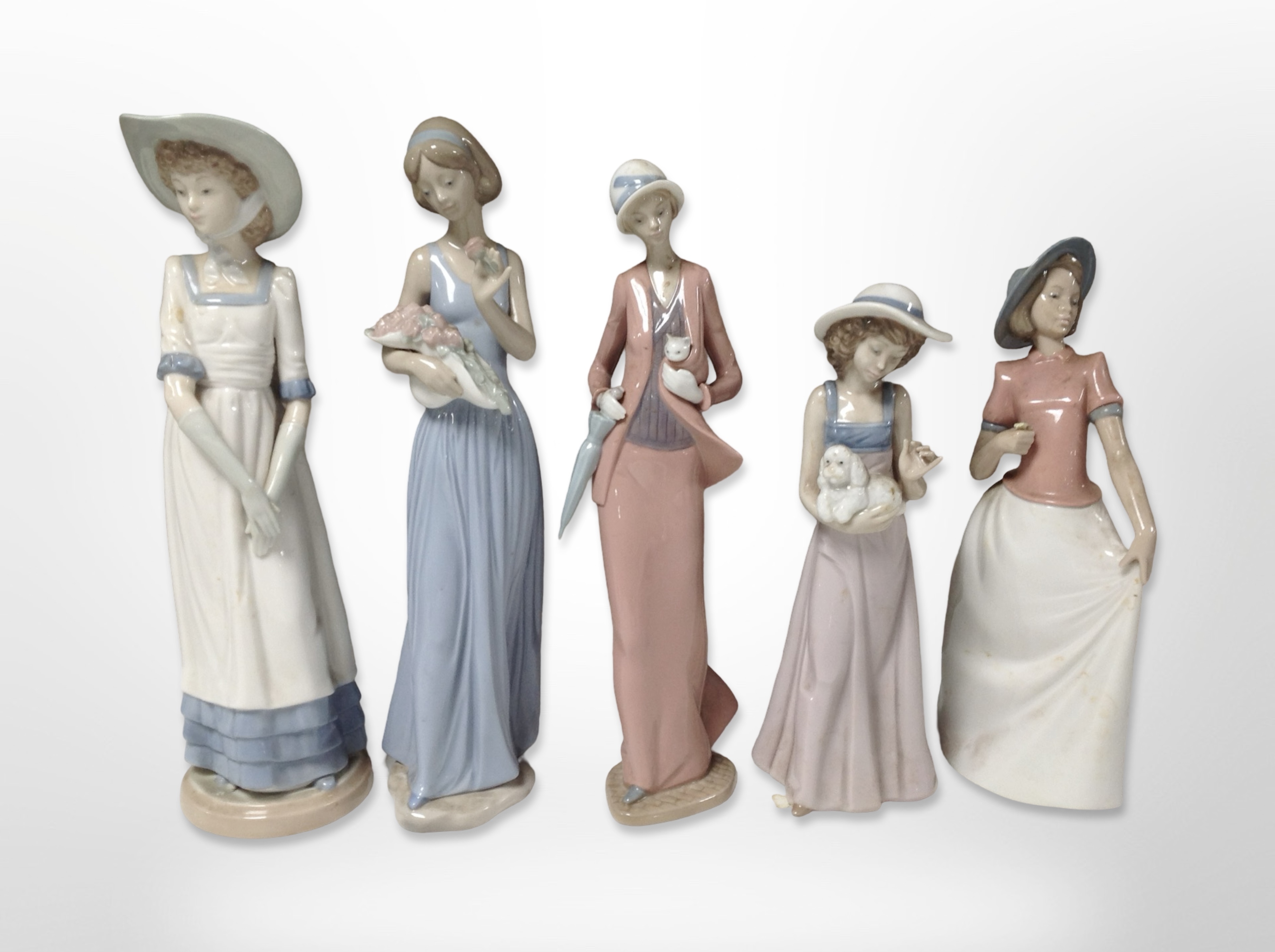 Five Nao figures of ladies, tallest 32cm.
