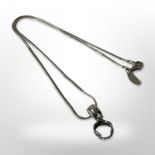 A silver Pandora pendant on chain.