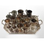 A silver plated octagonal serving tray containing assorted mugs and tankards, coal scuttle,