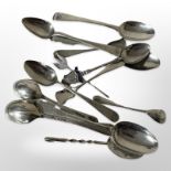A group of Georgian and later silver teaspoons and other cutlery.
