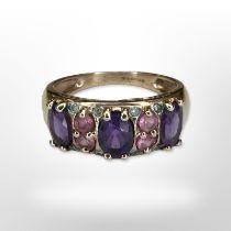 A 9ct yellow gold ring set with semi-precious stones, size N CONDITION REPORT: 3.3g.