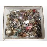 A small tray of mixed costume jewellery, Art Deco-style paste pieces, bangles, necklaces, etc.