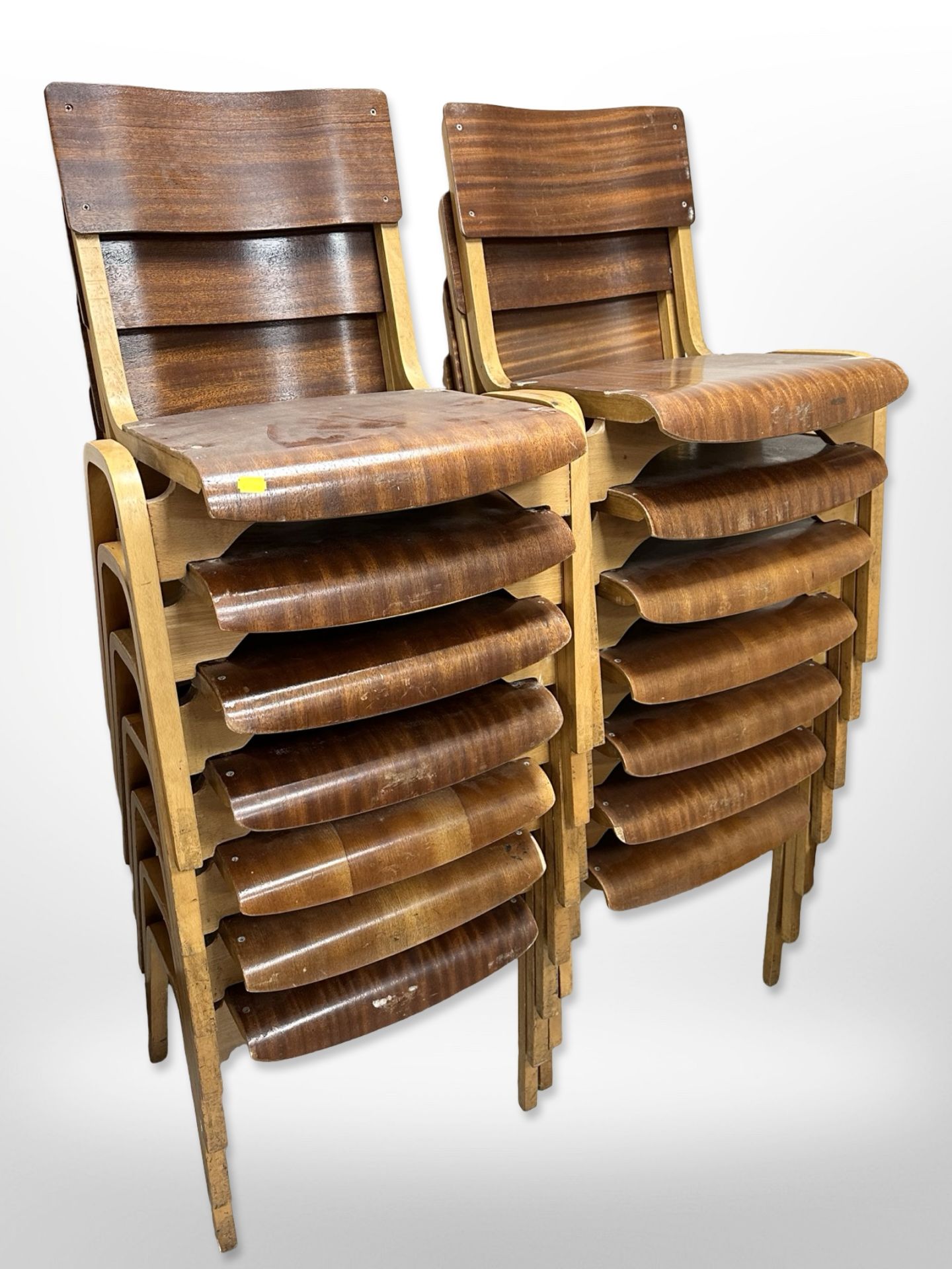 A set of fourteen 20th century laminated teak and bentwood stacking chairs,