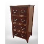 A reproduction mahogany five-drawer chest,