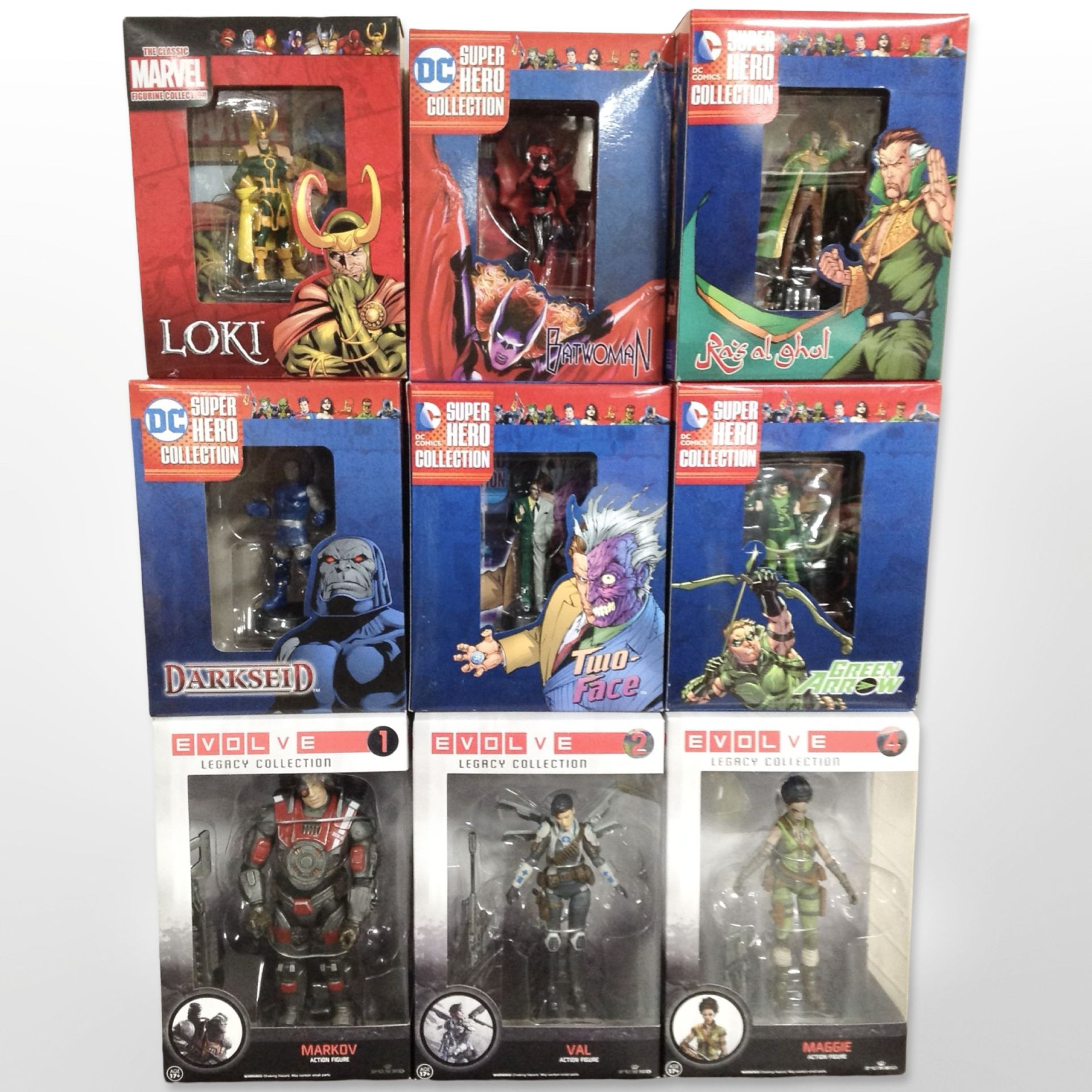 Seven DC Comics superhero figurines, a further Marvel figurine, and a Funko Evolve figurine,