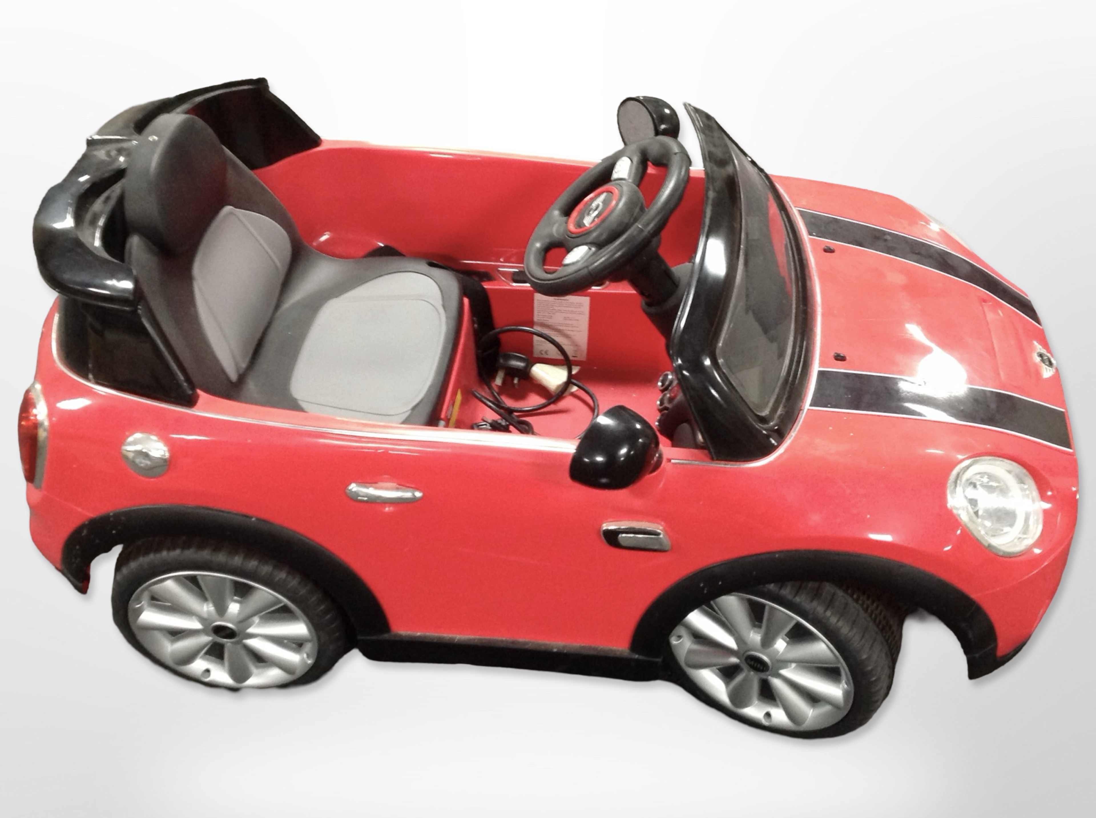 A child's electric Mini Cooper car, length 110cm.