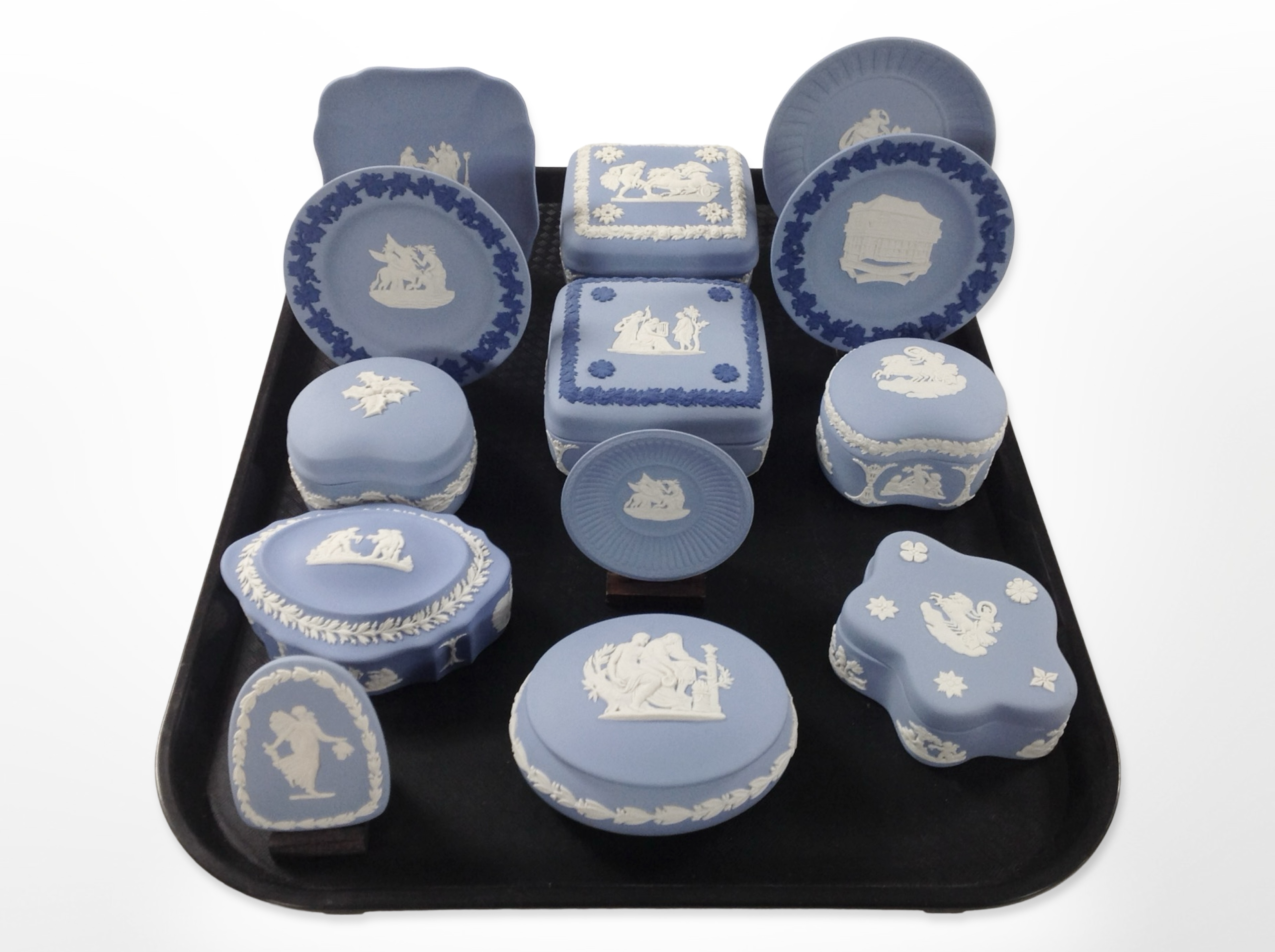 A group of Wedgwood blue and white Jasperware cabinet china.