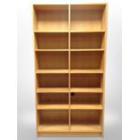 A Danish oak veneered open bookcase,