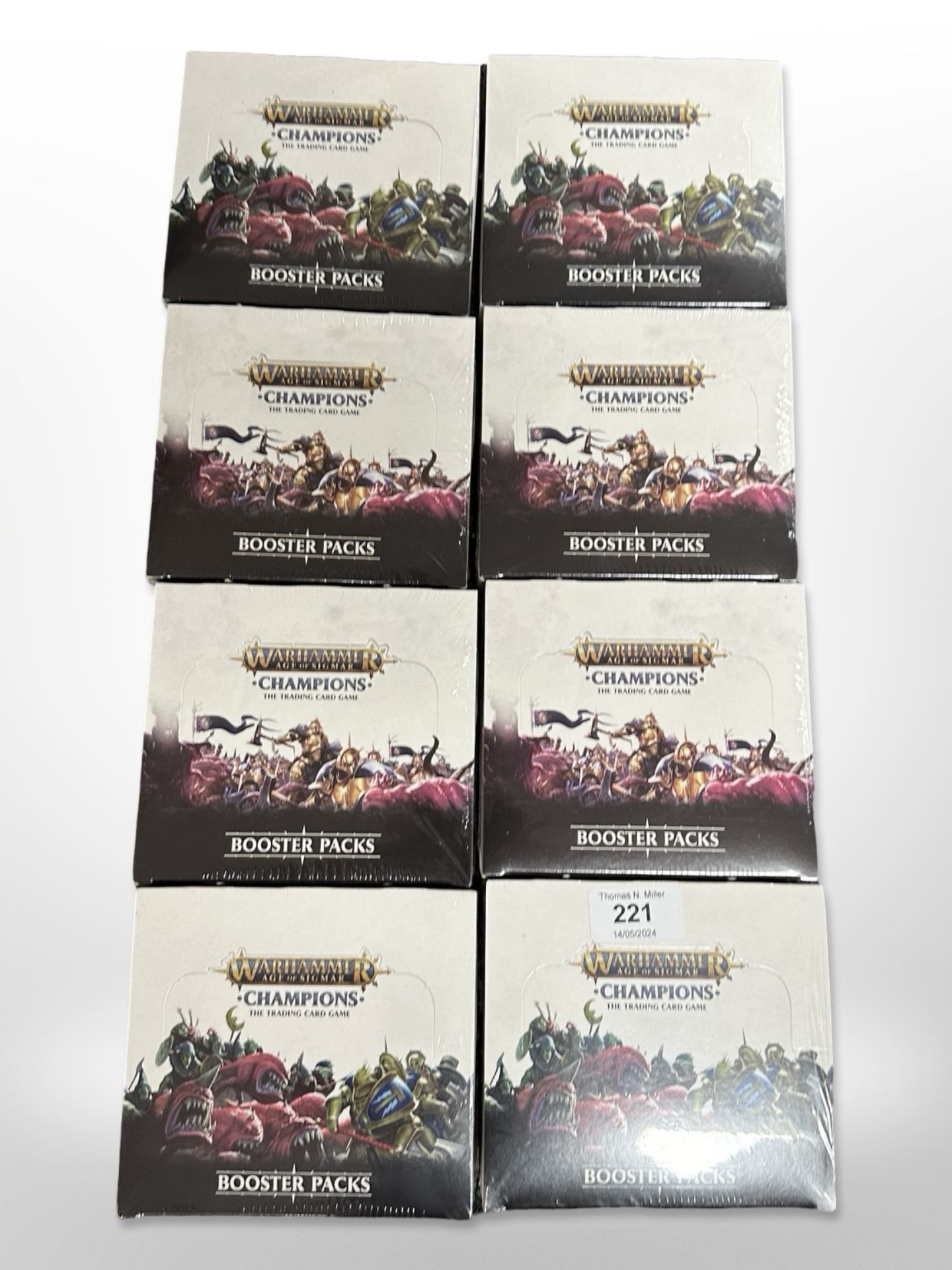 Eight Warhammer Age of Sigmar Champions Trading Card Game booster sets, all sealed in cellophane.