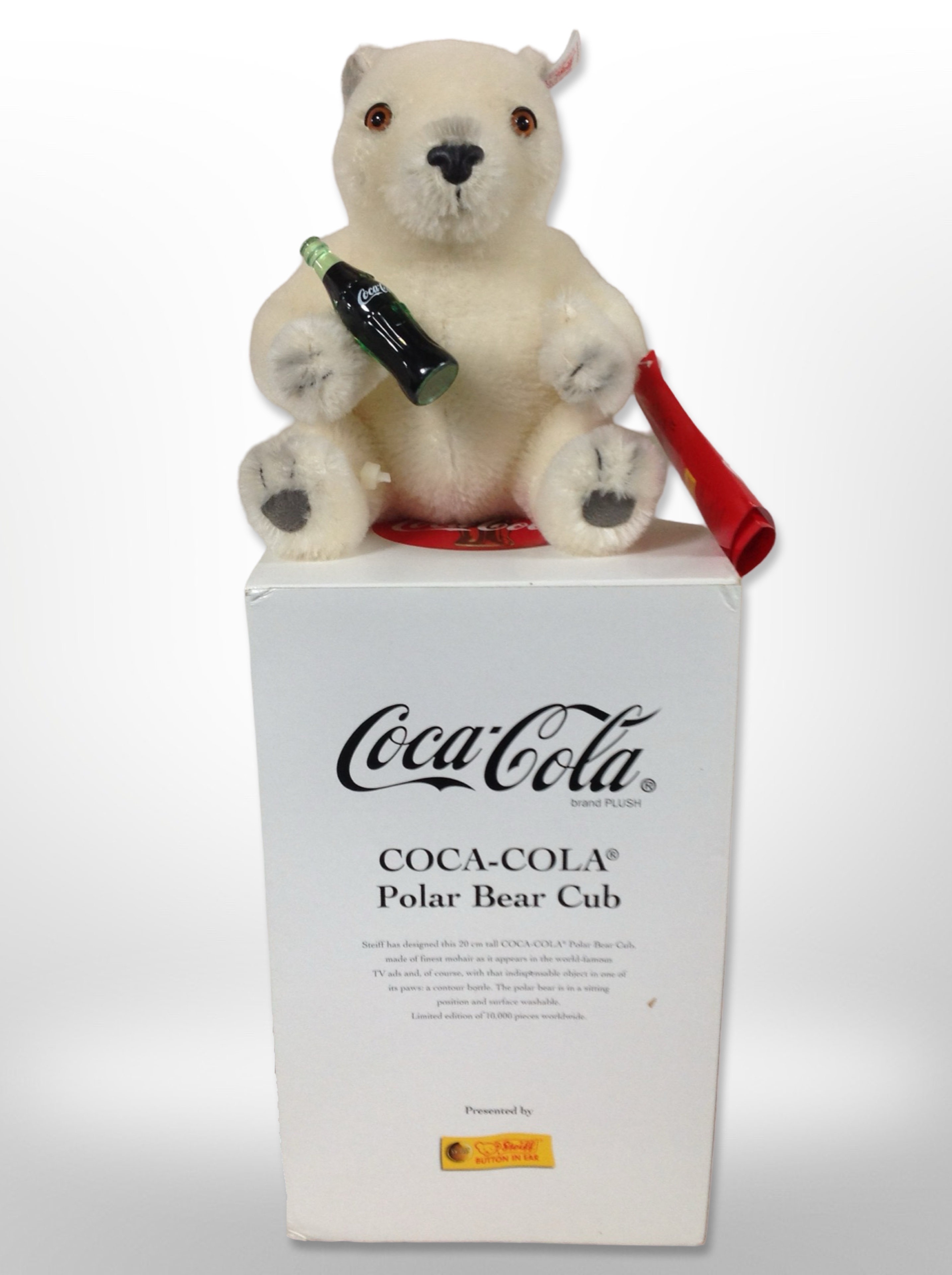 A Coca-Cola polar bear cub bear, manufactured by Steiff, in box, limited edition of 10,000 pieces.