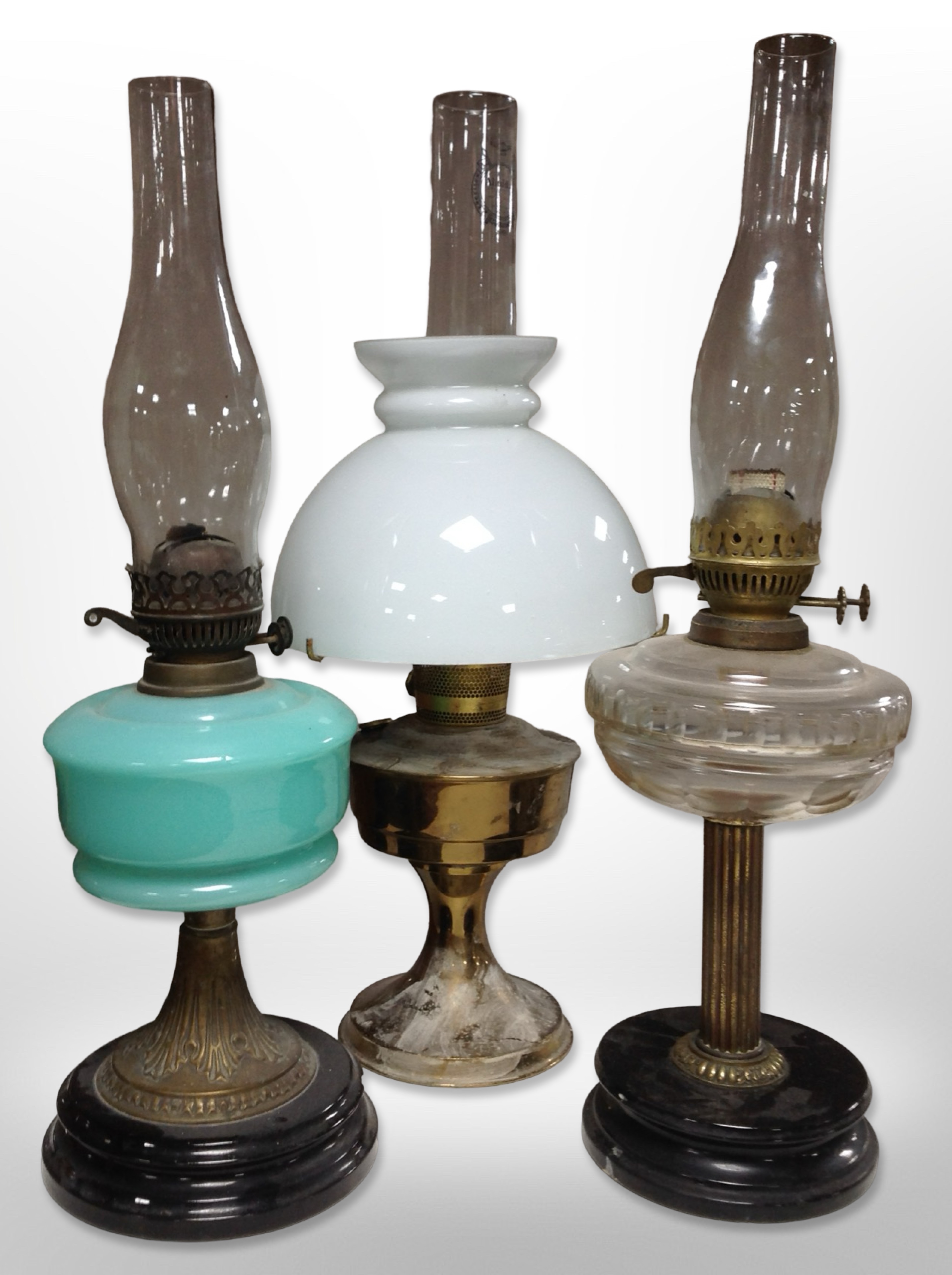 Three oil lamps,