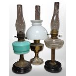 Three oil lamps,