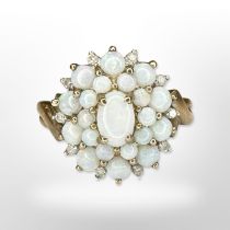 A 9ct yellow gold opal cluster ring, size N/O CONDITION REPORT: 3.1g.