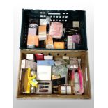 A collection of cosmetics and fragrances.