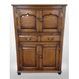 A Chapman's Siesta oak cupboard,