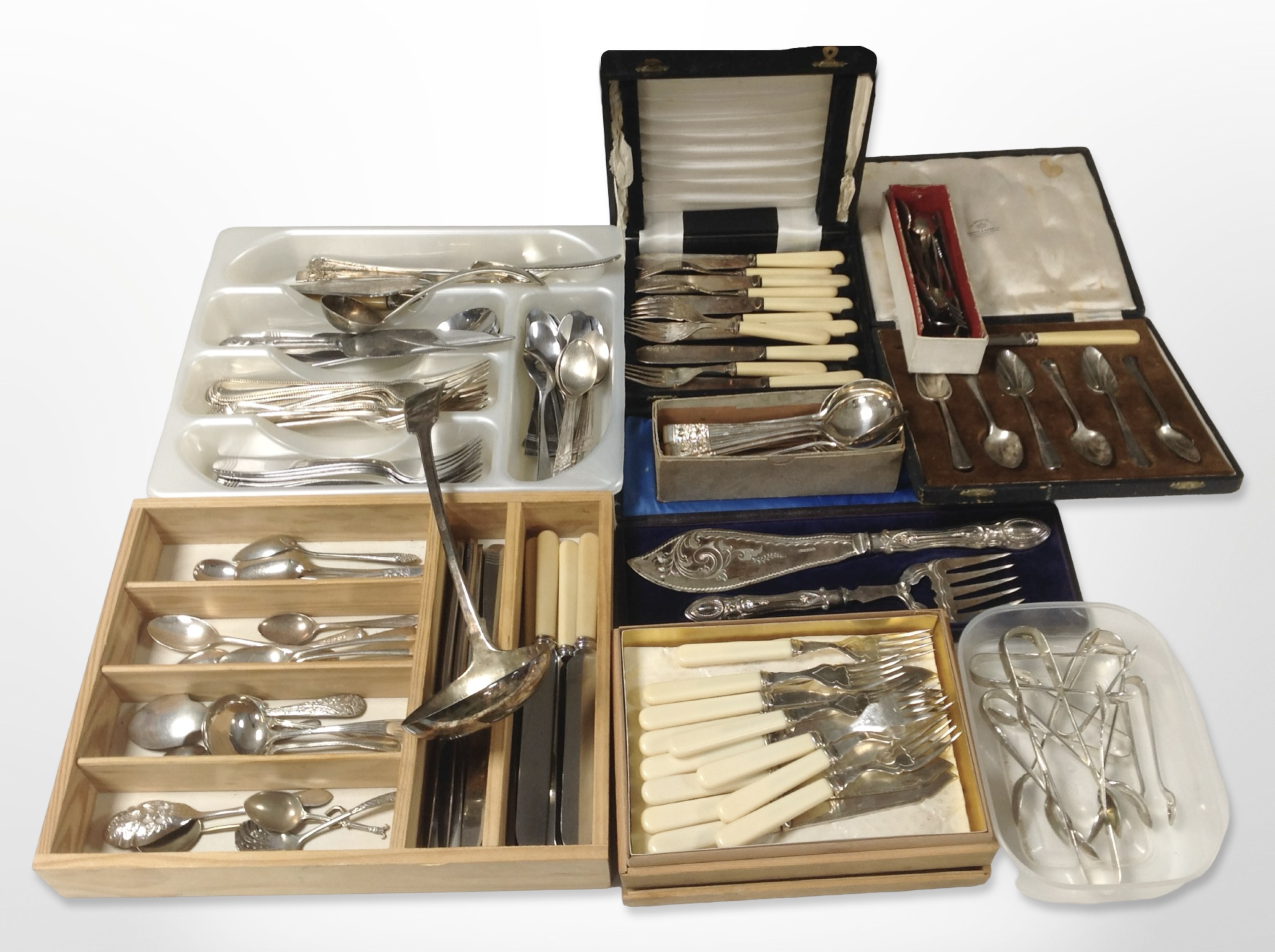 A quantity of cutlery sets and other un-boxed cutlery, cased pair of fish servers,