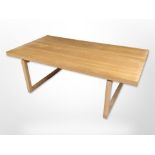 A contemporary oak rectangular coffee table,
