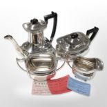 A silver-plated four-piece tea service, teapot 23cm high.