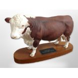 A Beswick Connoisseur Polled Hereford Bull on plinth, length 30cm.