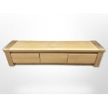 A contemporary oak Moreno Sokkell entertainment low sideboard fitted with two drawers,