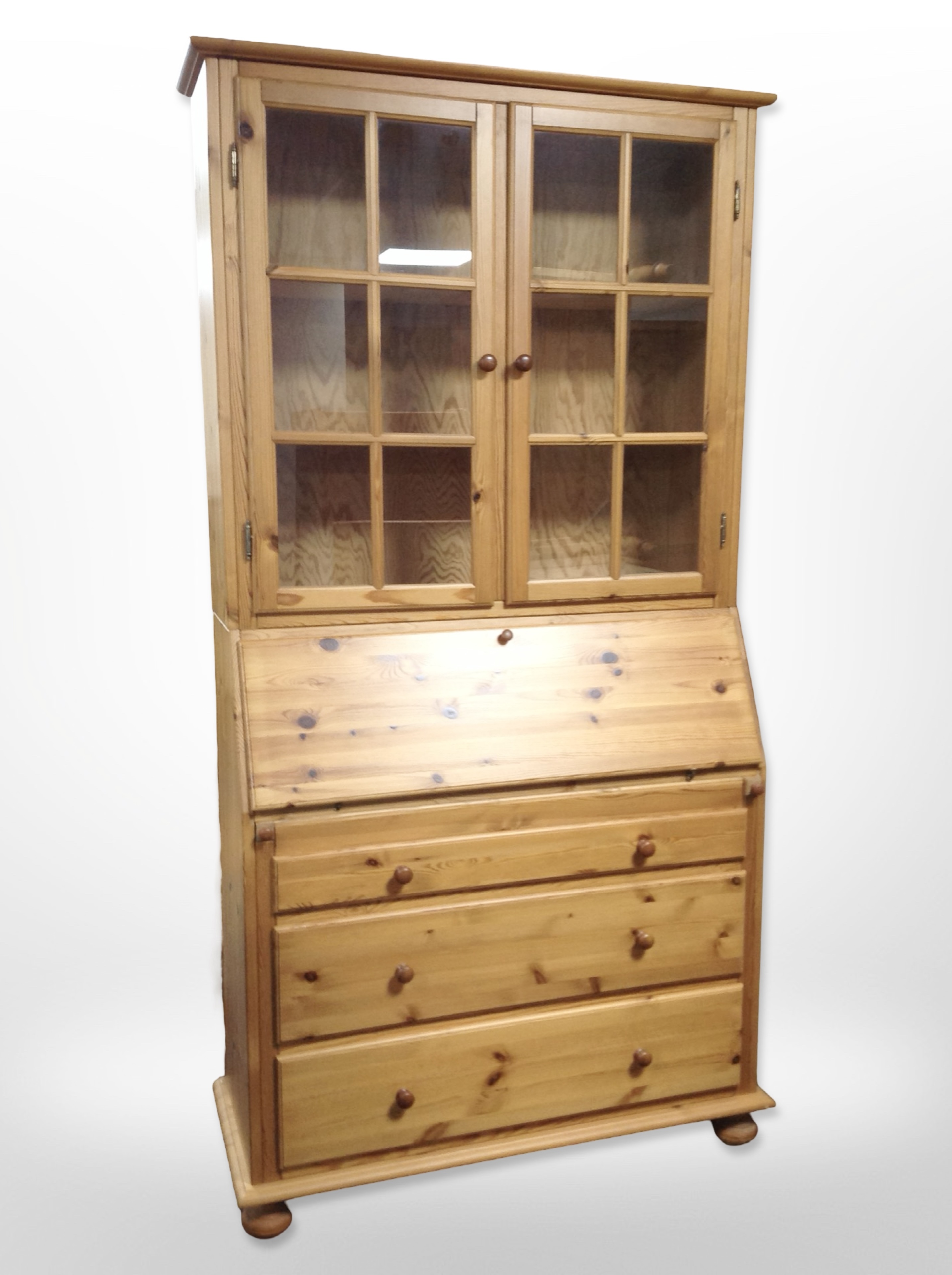 A contemporary pine bureau bookcase,