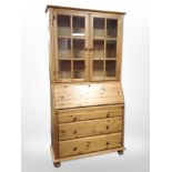 A contemporary pine bureau bookcase,