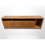 A teak mid century media unit, height 80 cm, width 248 cm, depth 45.5 cm.