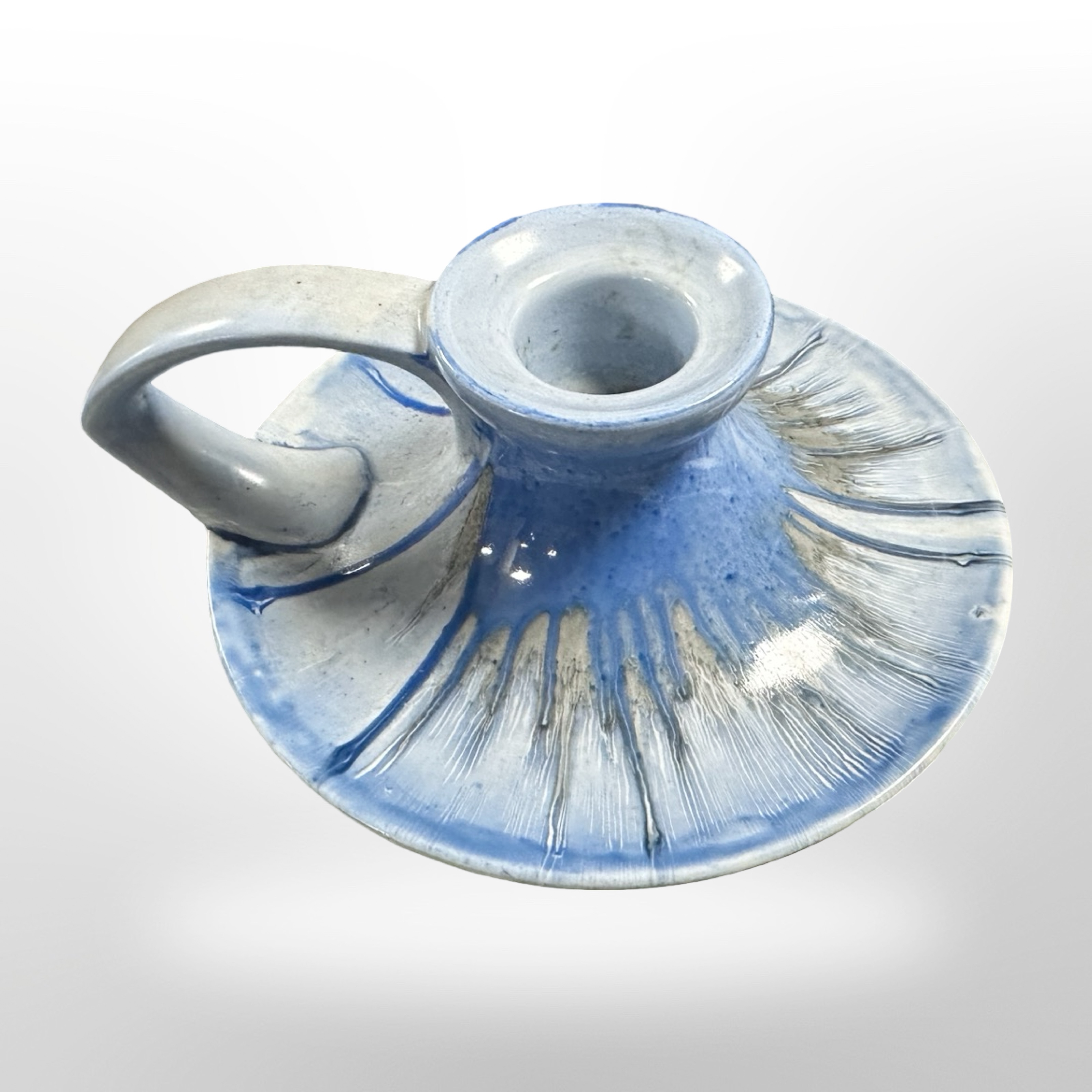 A Shelley blue-glazed porcelain chamber stick, diameter 11cm.