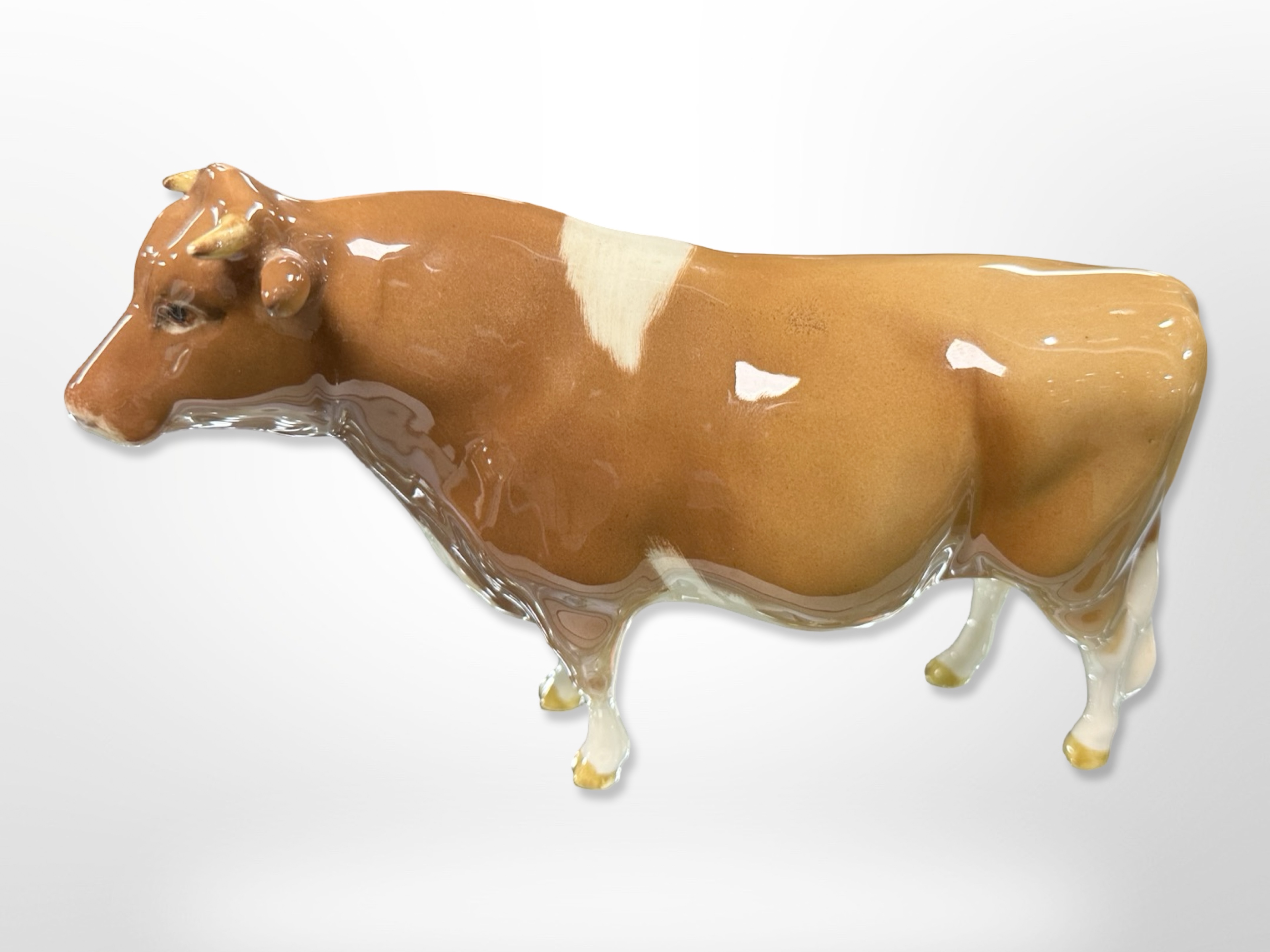 A Beswick cow, 'Ch. Sabrina's Sir Richmond 14th', length 18cm.