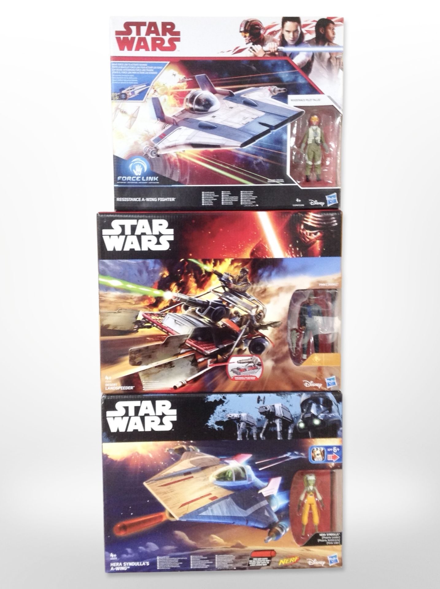 Three Hasbro Disney Star Wars models, Resistance A-Wing Fighter, Desert Landspeeder,