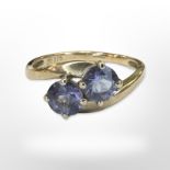 A 9ct yellow gold two stone amethyst ring, size O/P CONDITION REPORT: 2g.